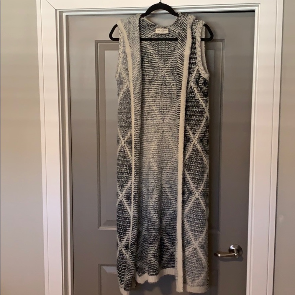 Ankle length hooded cardigan.